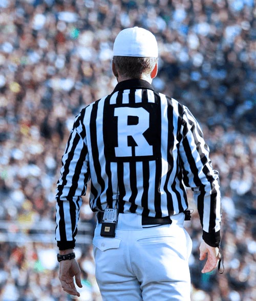 Referee at football game.
